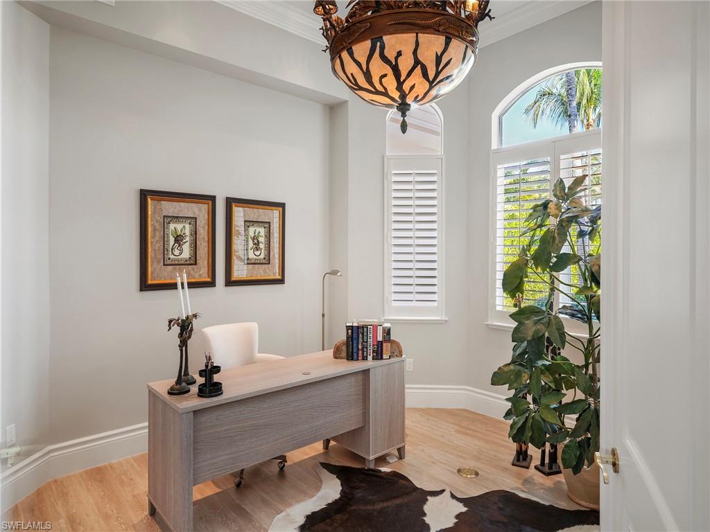 216 Springline Drive Naples, FL 34102 - Photo 17 of 46 Office space featuring light wood-type flooring and ornamental molding