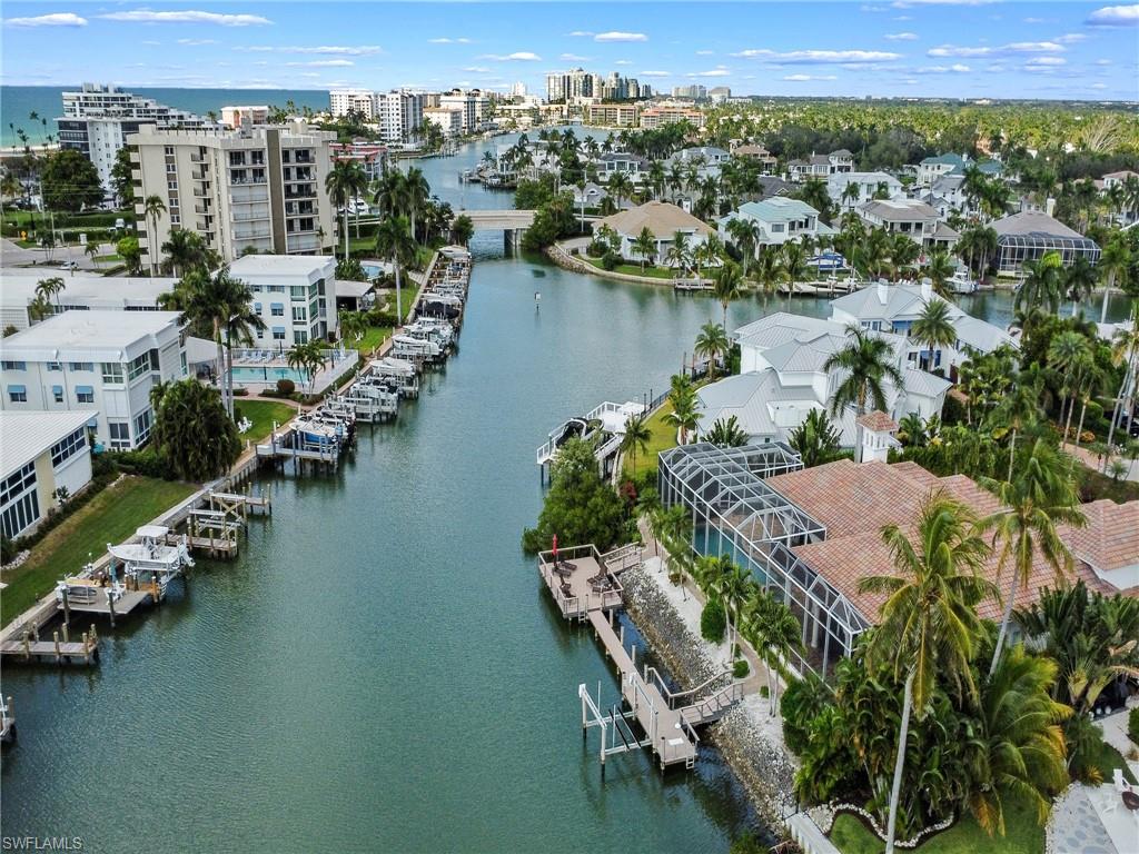 216 Springline Drive Naples, FL 34102 - Photo 41 of 46 View of urban area with a nearby body of water