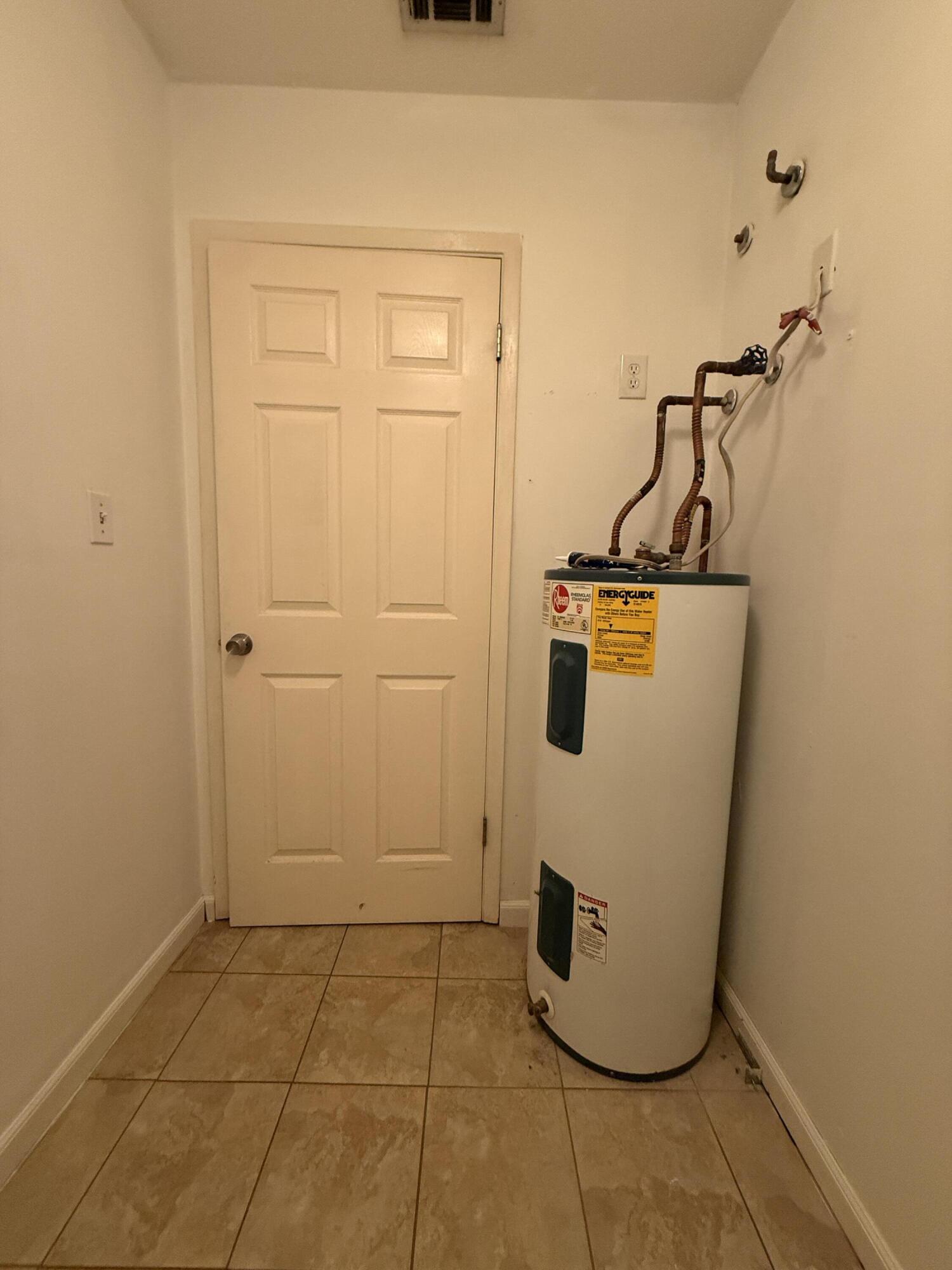 1054 9th Street Shalimar, FL 32579 - Photo 18 of 45 a view of a storage & utility room with a sink