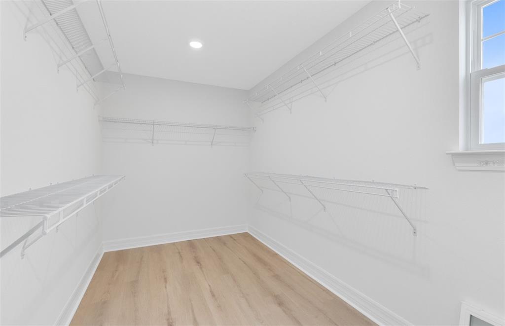 9821 Autumn Rdg Avenue Riverview, FL 33578 - Photo 12 of 30 a view of a room with empty racks