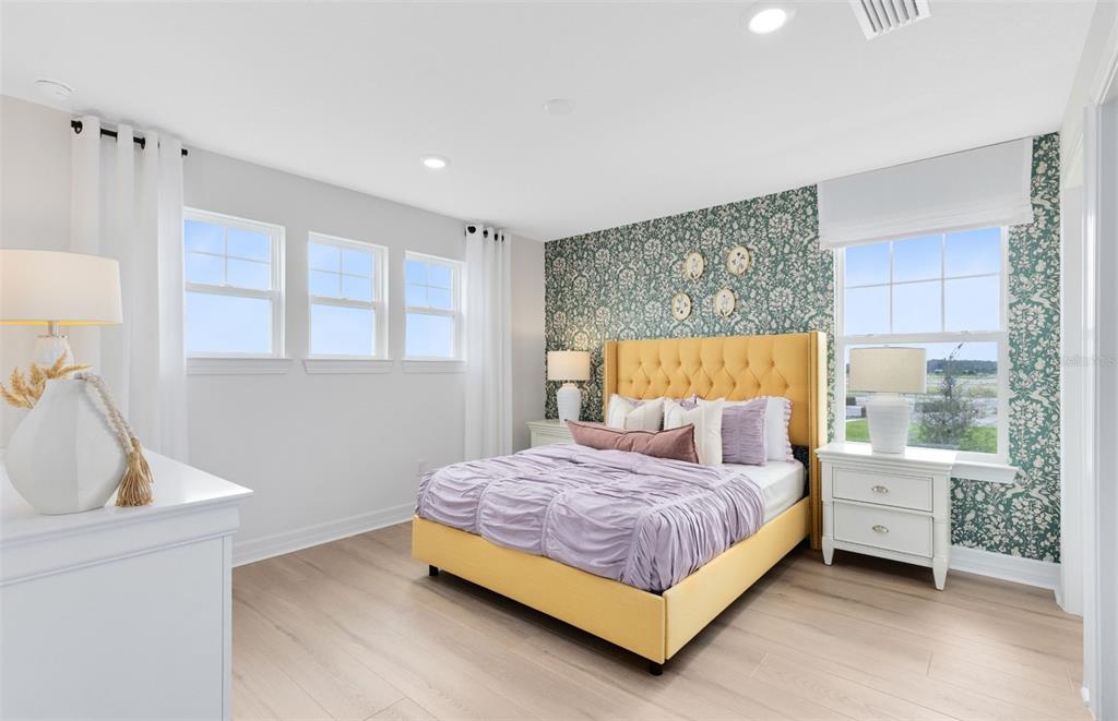 9821 Autumn Rdg Avenue Riverview, FL 33578 - Photo 14 of 30 a bedroom with a bed and a window