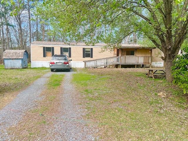 1007 North Point Drive Acworth, GA 30102 - Photo 1 of 1 a front view of a house with a yard and trees