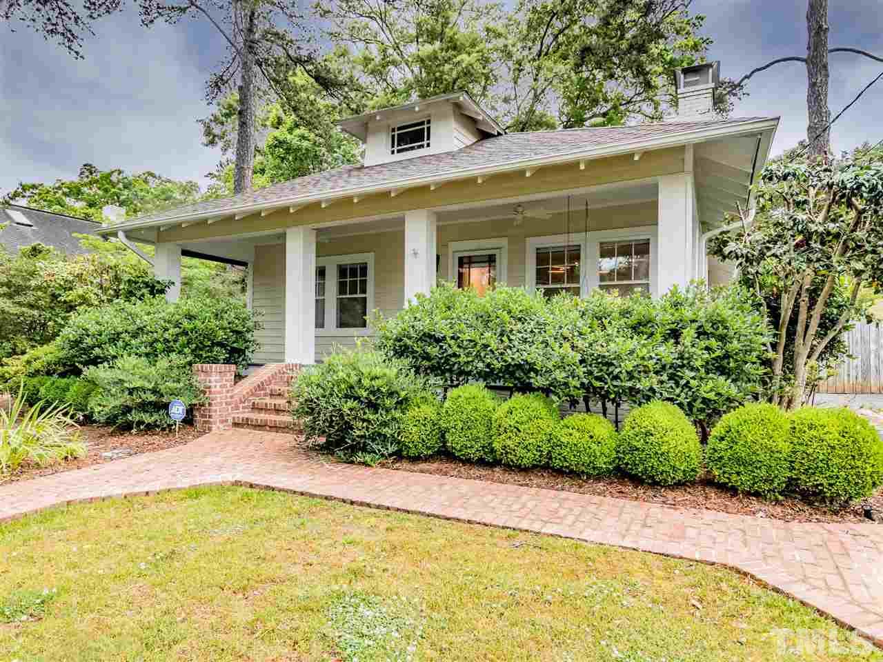 2215 The Circle Raleigh, NC 27608 - Photo 2 of 30 front view of a house with a yard