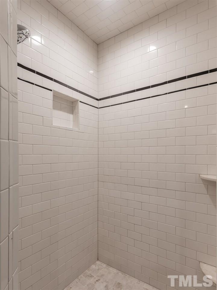 2215 The Circle Raleigh, NC 27608 - Photo 21 of 30 a bathroom with a shower