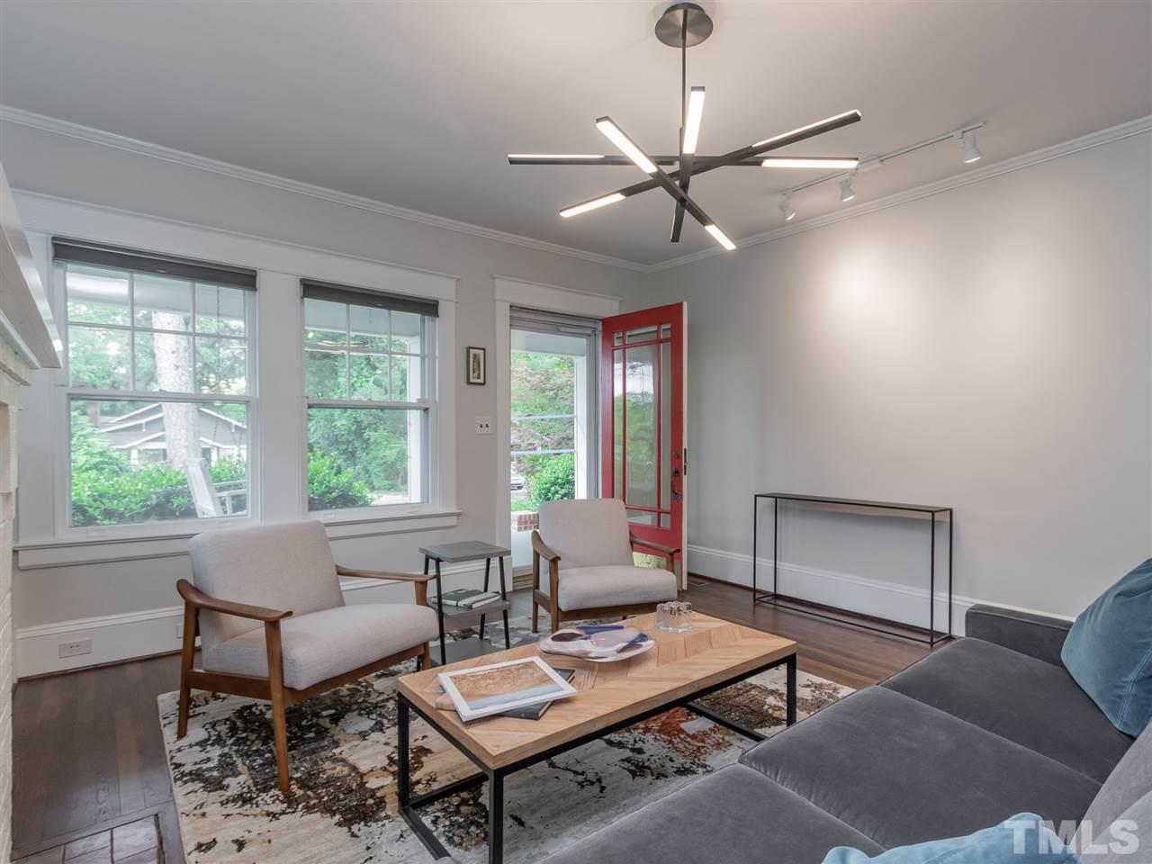 2215 The Circle Raleigh, NC 27608 - Photo 5 of 30 a living room with furniture and a window