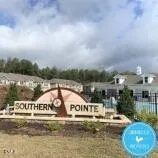 a view of a lake with a city from a lake