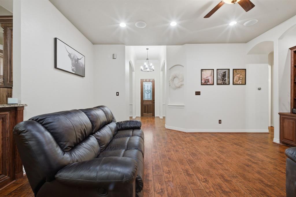 603 Cedar Drive Pilot Point, TX 76258 - Photo 11 of 39 Open-concept living area featuring wood-finish flooring, recessed lighting, and a ceiling fan