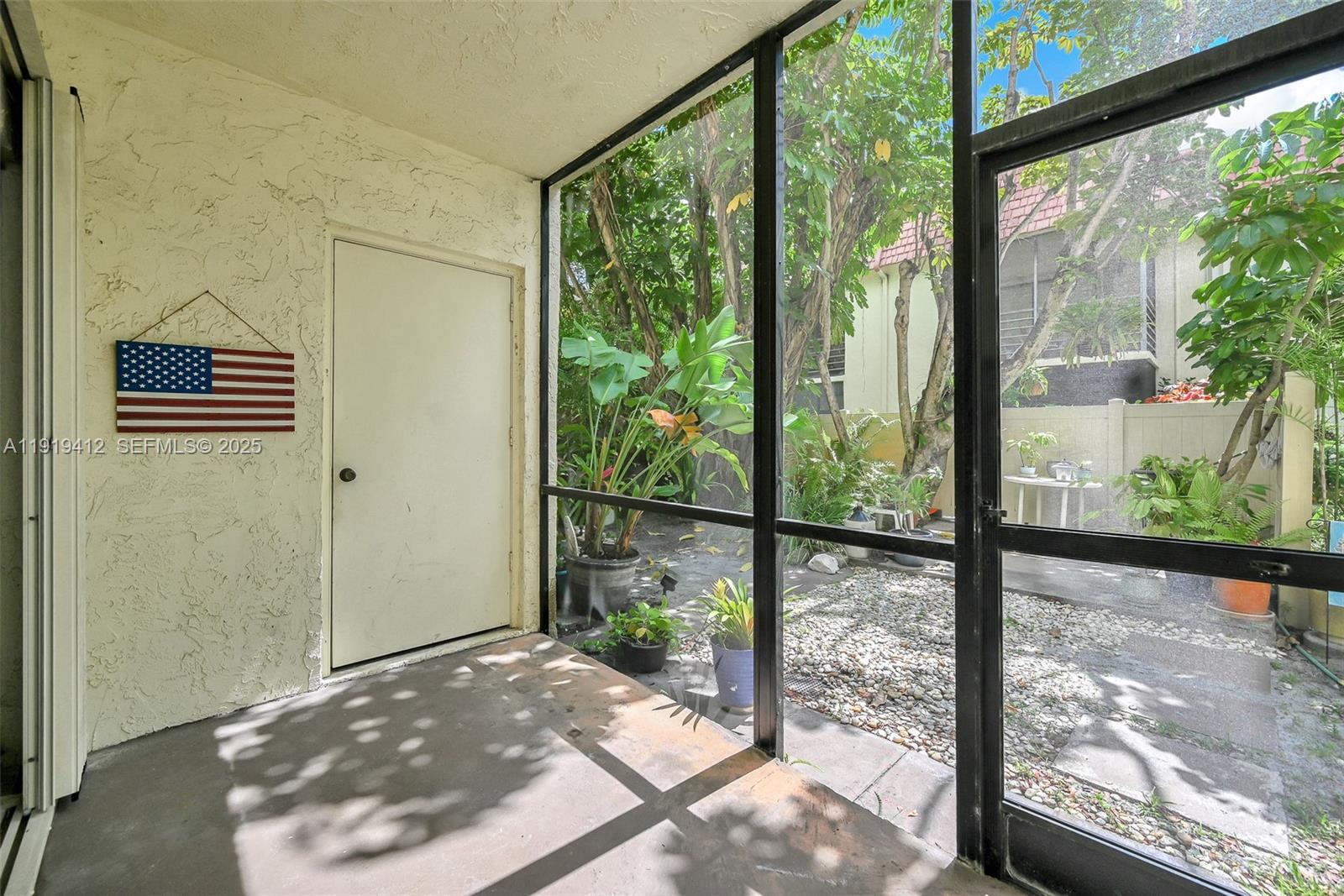 132 South Cypress Road, Unit 518 Pompano Beach, FL 33060 - Photo 31 of 60 a view of a backyard from window