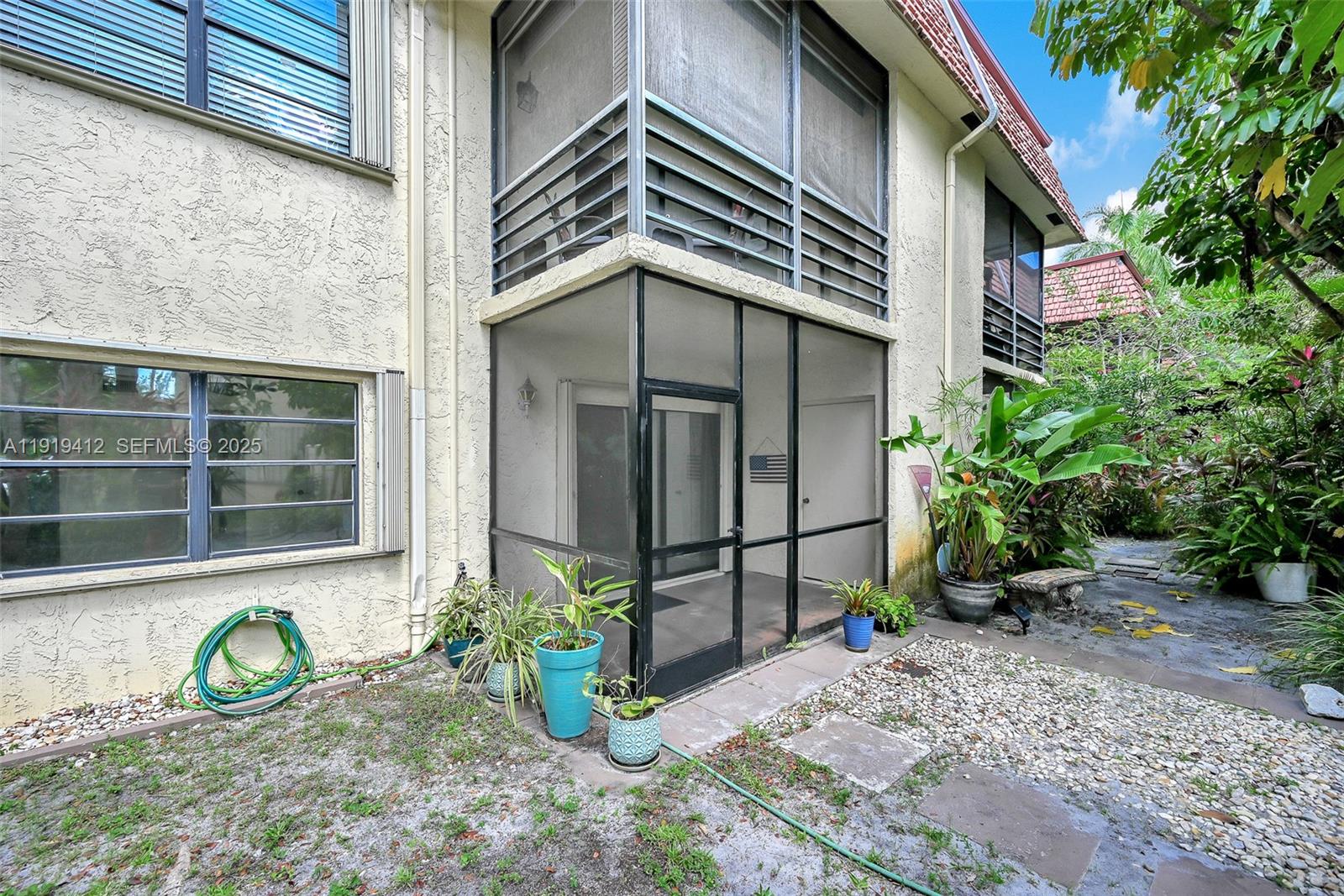 132 South Cypress Road, Unit 518 Pompano Beach, FL 33060 - Photo 36 of 60 a front view of a house