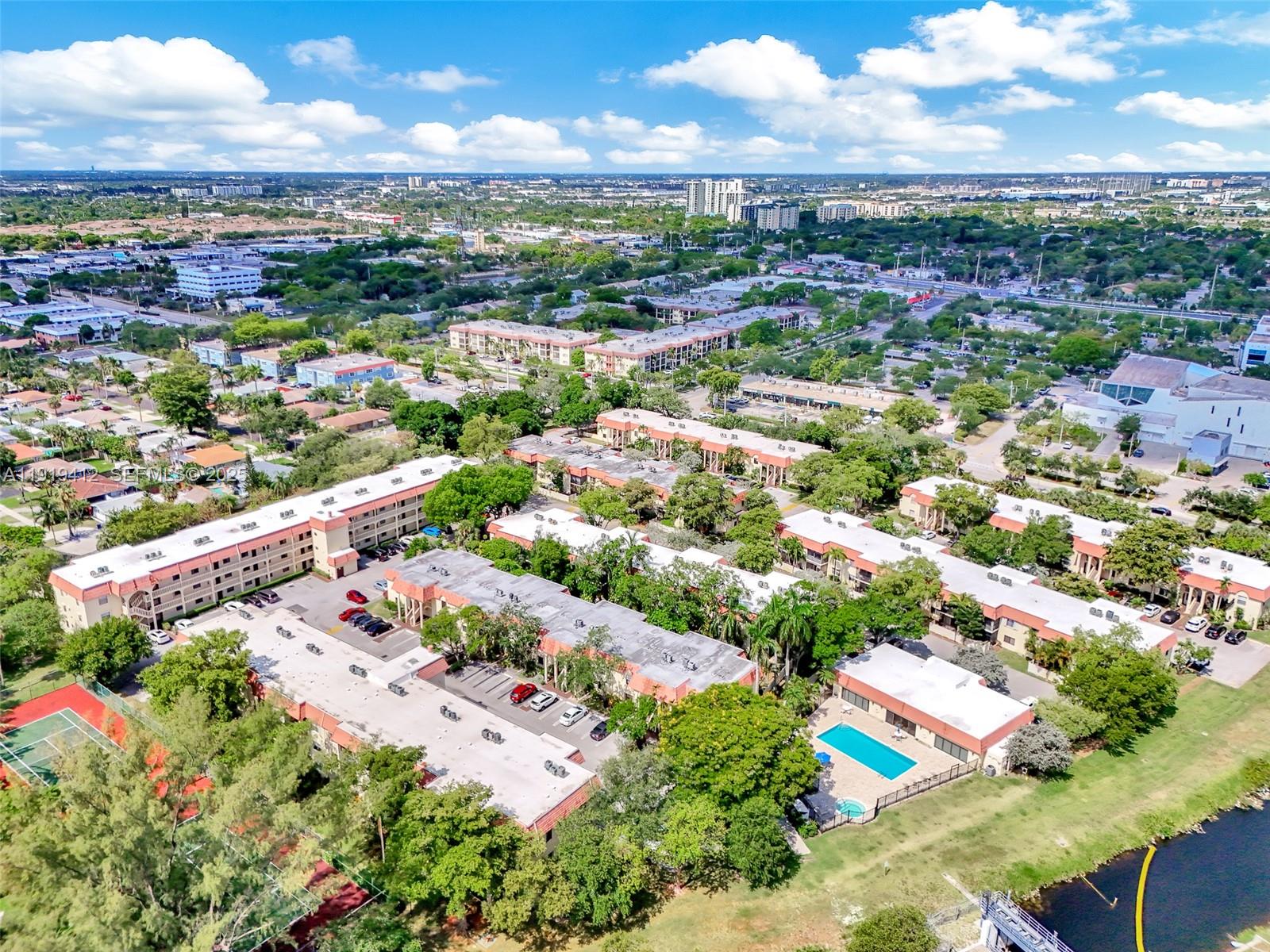 132 South Cypress Road, Unit 518 Pompano Beach, FL 33060 - Photo 47 of 60 an aerial view of residential houses with outdoor space