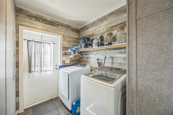 a utility room with dryer and washer