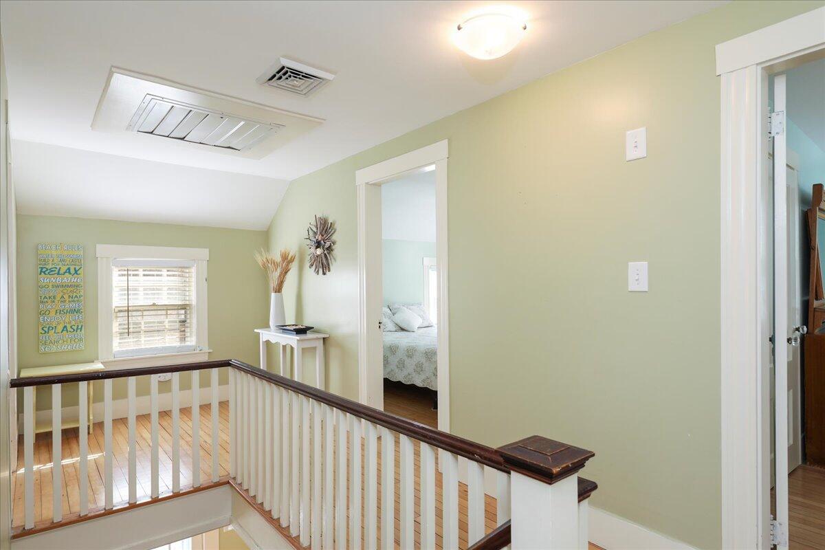45 Cottontail Road Wellfleet, MA 02667 - Photo 12 of 44 a view of staircase with wooden floor and a window