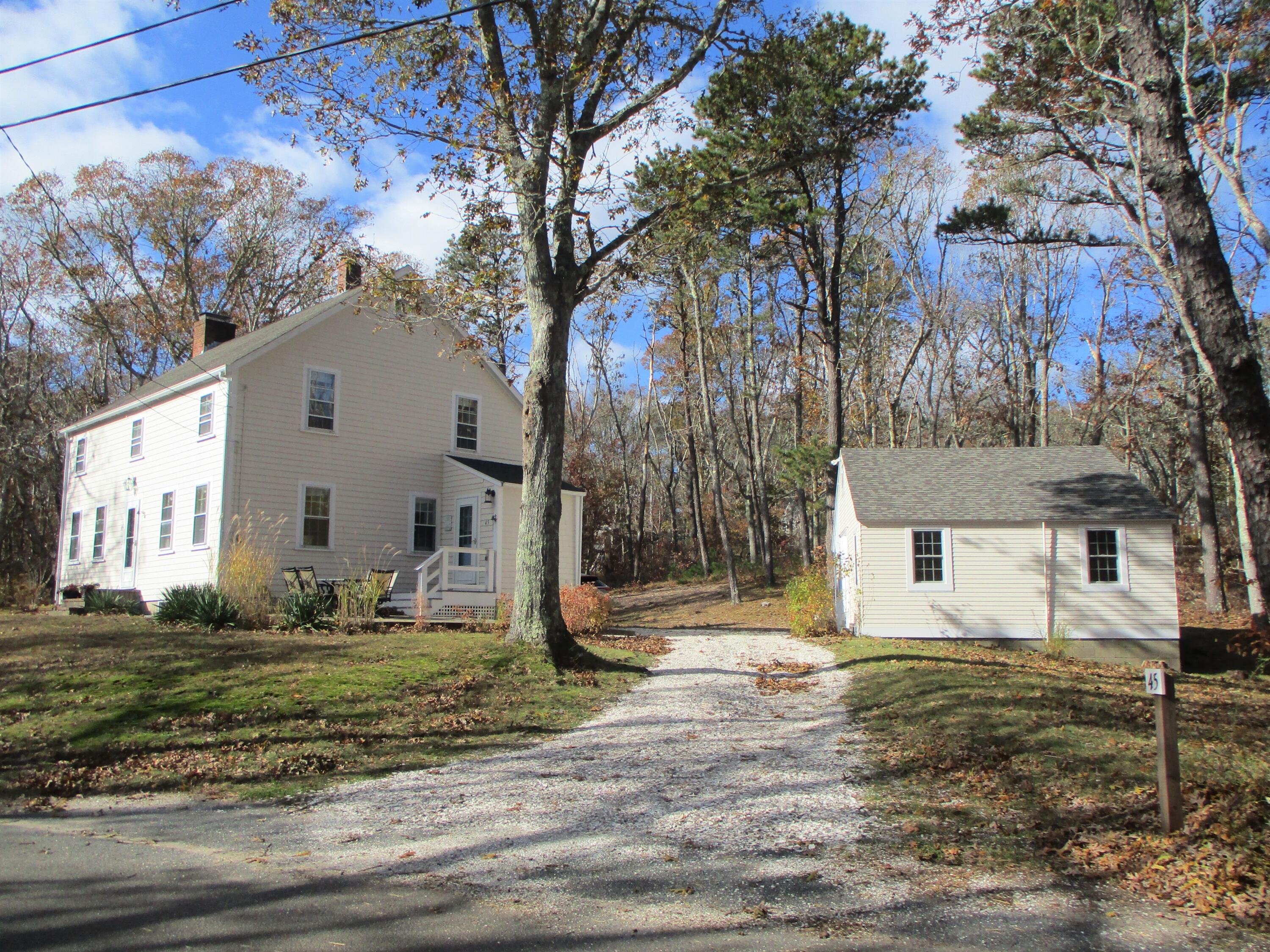 45 Cottontail Road Wellfleet, MA 02667 - Photo 2 of 44 a house that has a tree in front of it