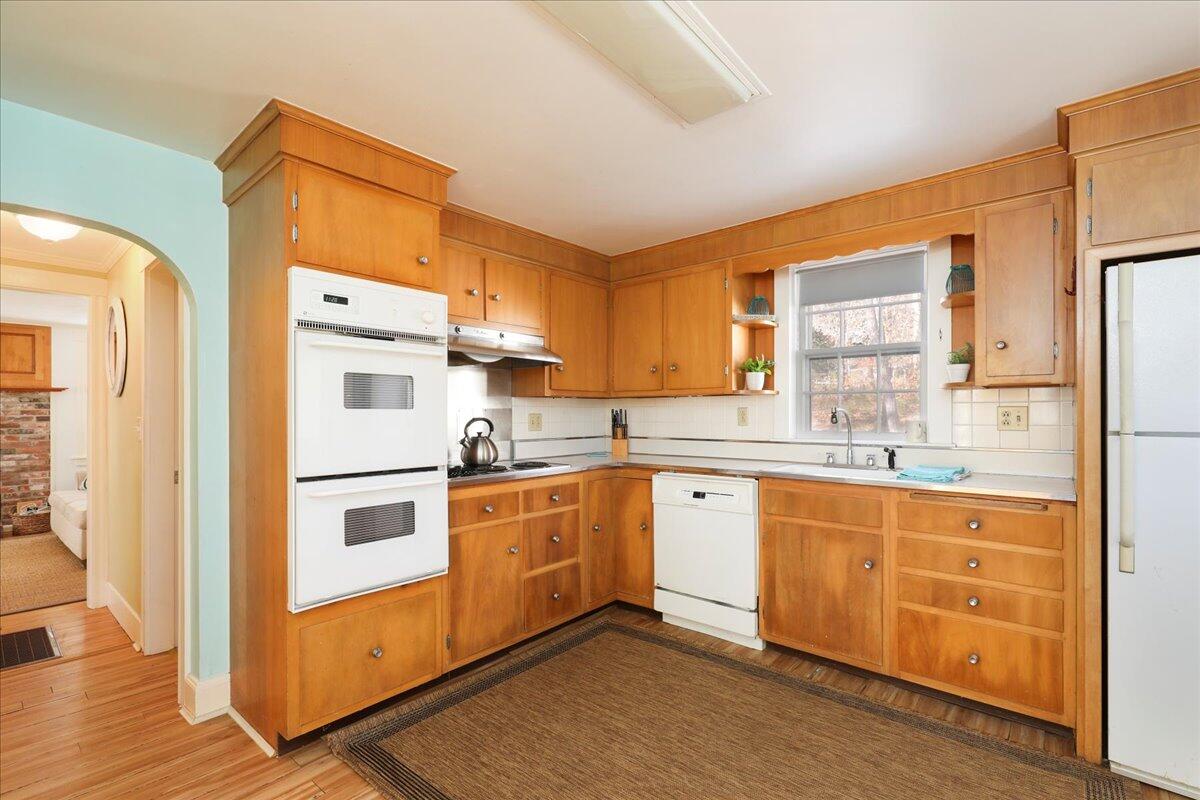 45 Cottontail Road Wellfleet, MA 02667 - Photo 7 of 44 a kitchen with stainless steel appliances a refrigerator sink and cabinets