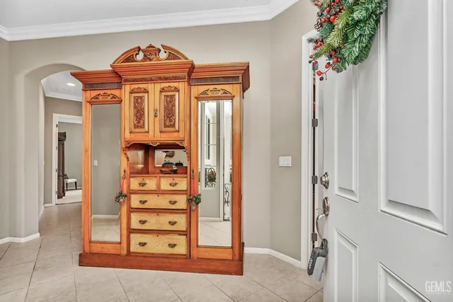 a view of a livingroom with furniture and a window