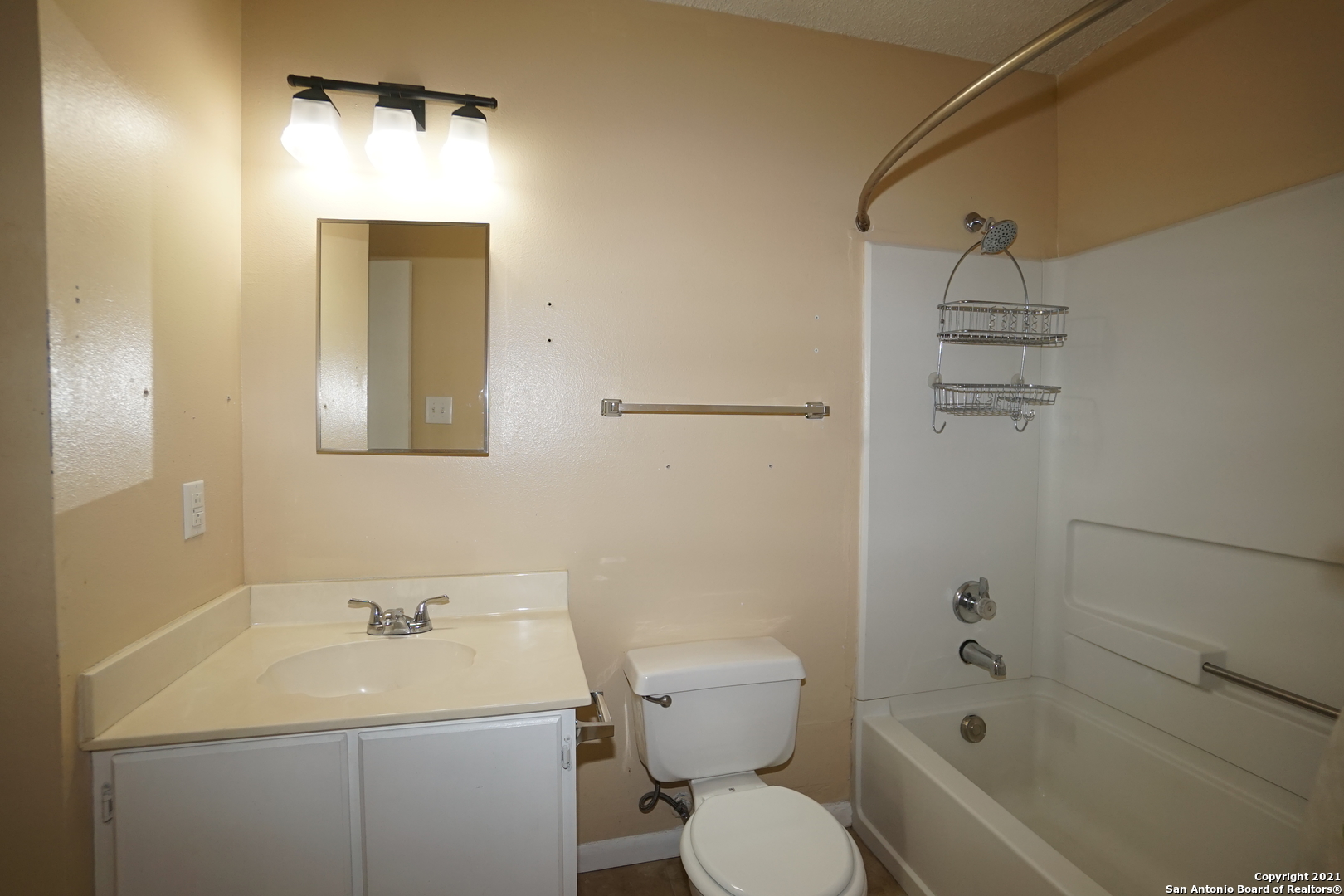 811 Meadow Scape Converse, TX 78109 - Photo 13 of 19 a bathroom with a sink a toilet and shower