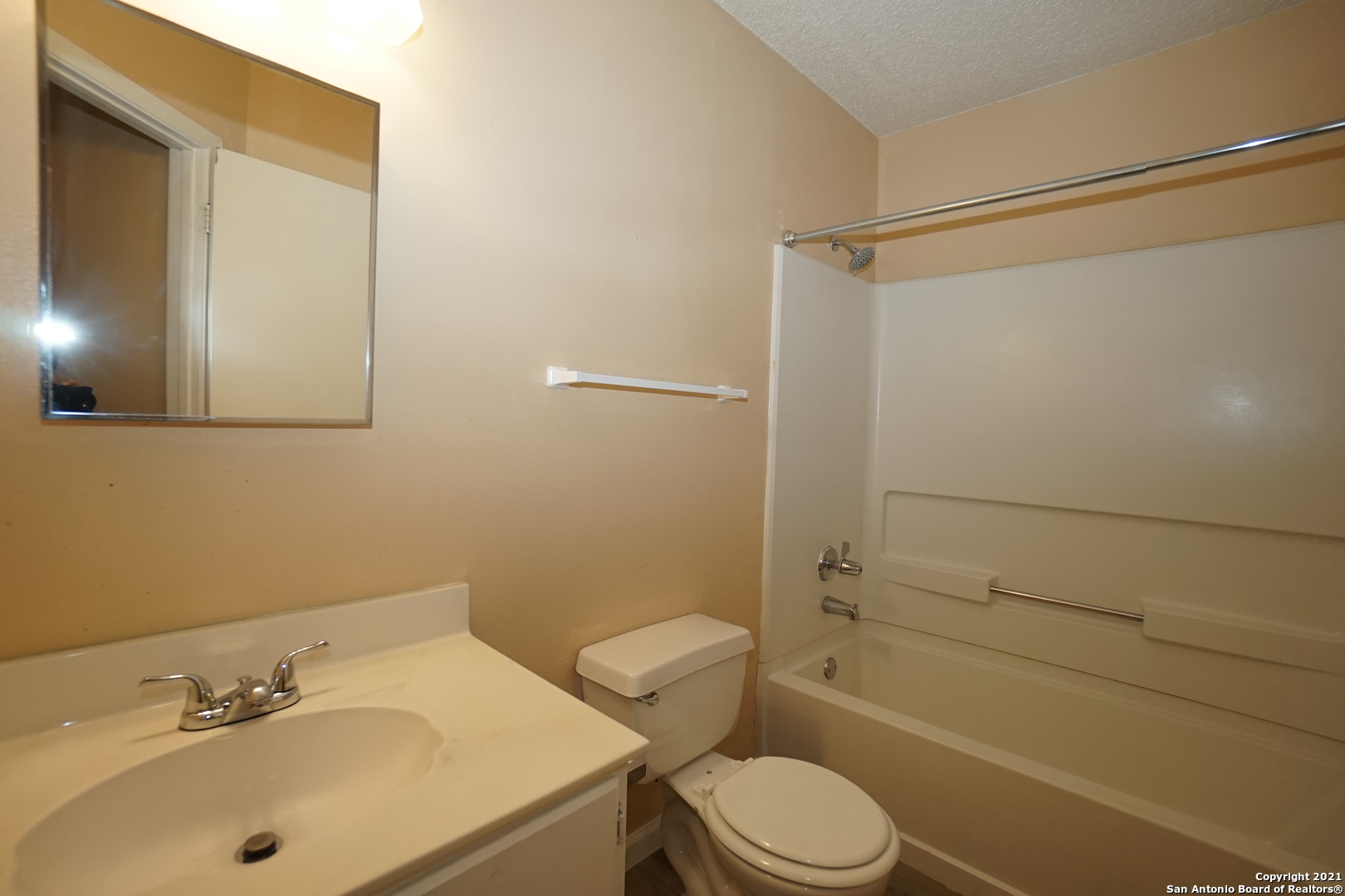 811 Meadow Scape Converse, TX 78109 - Photo 19 of 19 a bathroom with a sink toilet and shower