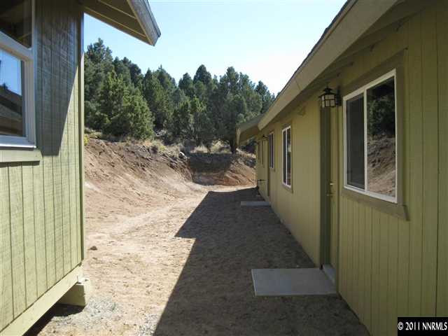2830 Goldfield Road Reno, NV 89521 - Photo 11 of 13 a view of a pathway of a house with backyard