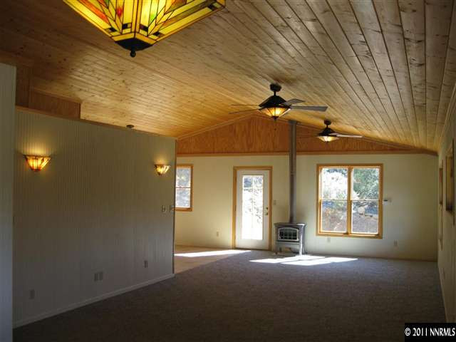 2830 Goldfield Road Reno, NV 89521 - Photo 4 of 13 a view of an empty room with a window