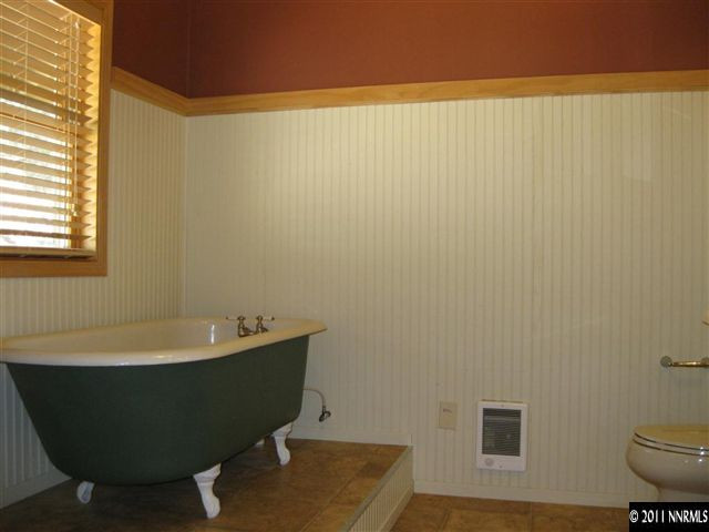 2830 Goldfield Road Reno, NV 89521 - Photo 7 of 13 a bathroom with a sink and a bathtub