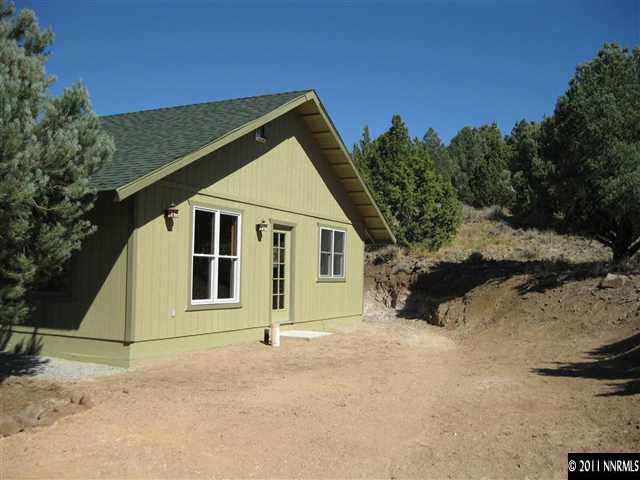 2830 Goldfield Road Reno, NV 89521 - Photo 9 of 13 front view of a house with a yard