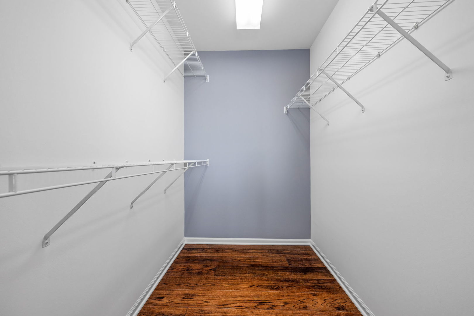 15341 Pinewood Road, Unit 15341 Lockport, IL 60441 - Photo 16 of 21 a view of a room with racks on the wall