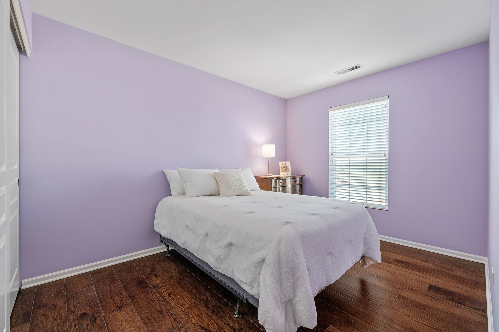 15341 Pinewood Road, Unit 15341 Lockport, IL 60441 - Photo 17 of 21 a bedroom with a bed and a window