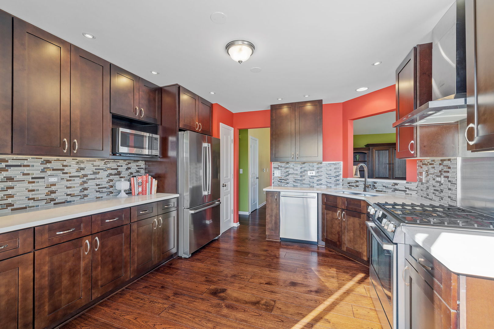 15341 Pinewood Road, Unit 15341 Lockport, IL 60441 - Photo 6 of 21 a kitchen with stainless steel appliances granite countertop wooden cabinets and sink