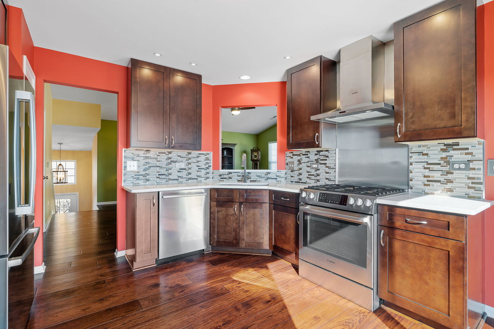 15341 Pinewood Road, Unit 15341 Lockport, IL 60441 - Photo 7 of 21 a kitchen with stainless steel appliances granite countertop a stove and cabinets