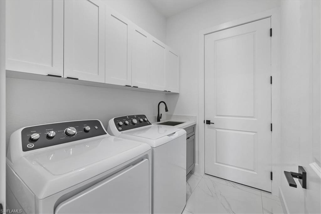 3812 9th Street Southwest Lehigh Acres, FL 33976 - Photo 28 of 39 a room with storage and utility