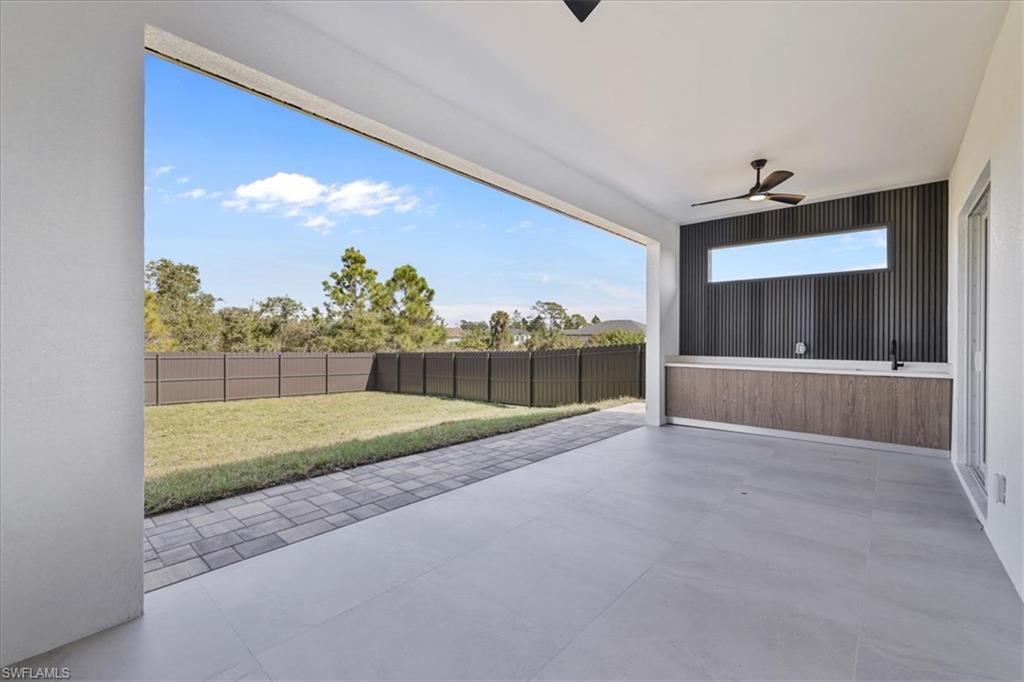 3812 9th Street Southwest Lehigh Acres, FL 33976 - Photo 31 of 39 a view of outdoor space and yard
