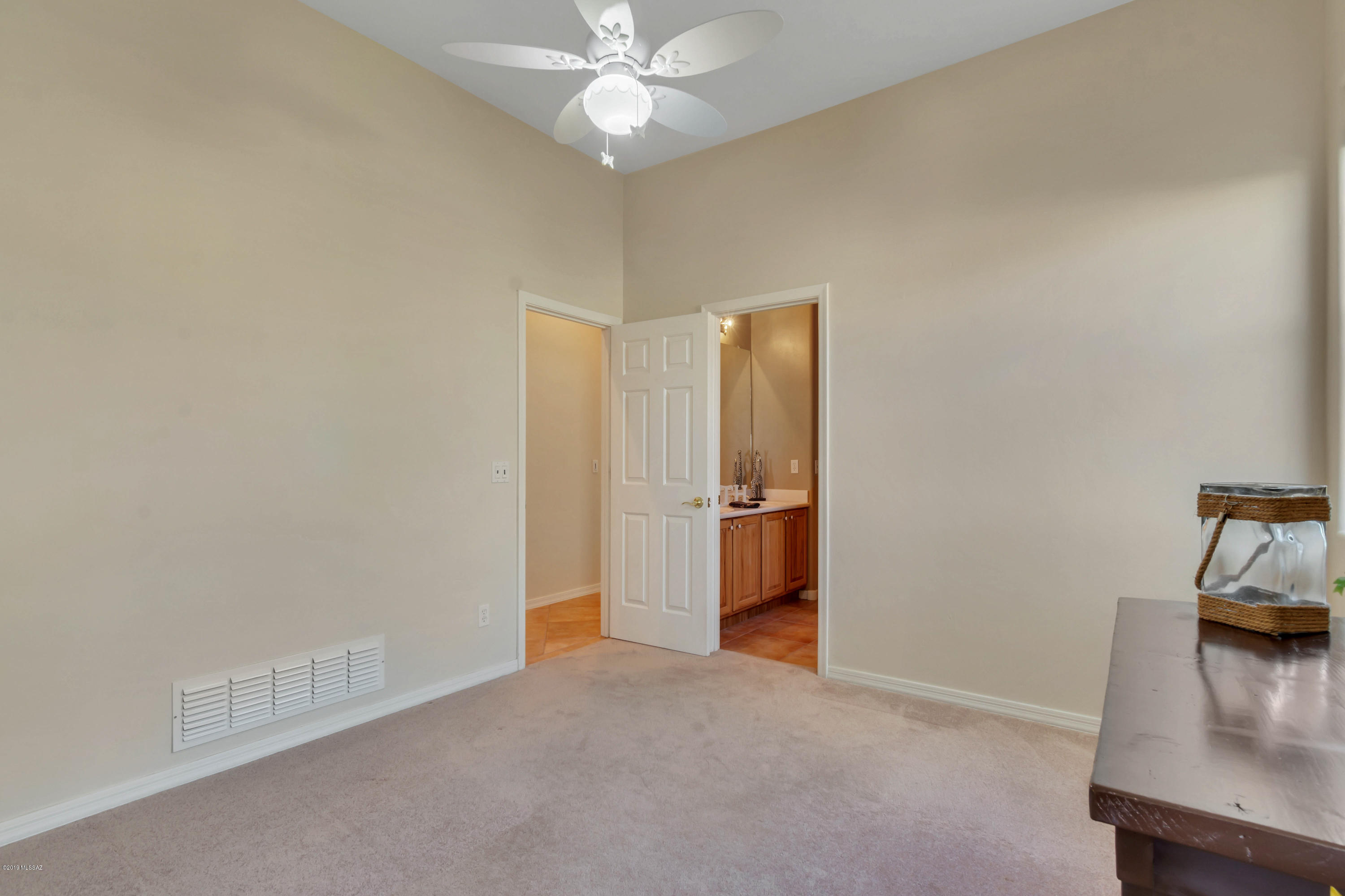 12682 North Spirit Mountain Road Oro Valley, AZ 85755 - Photo 11 of 40 a view of a livingroom with a staircase