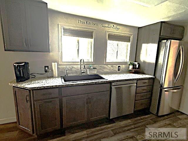 329 North Bridge Street St. Anthony, ID 83445 - Photo 4 of 16 Bright windows over sink and work area