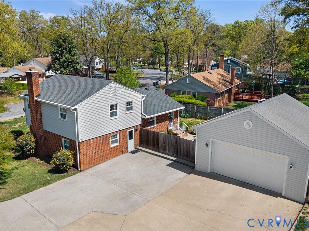 1455 Robindale Road Richmond, VA 23235 - Photo 2 of 29 a aerial view of a house with large trees