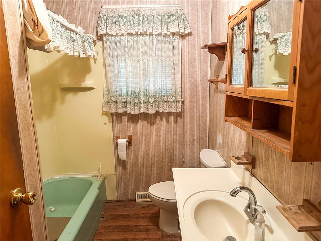 1173 Freeport Road Kittanning, PA 16201 - Photo 4 of 22 a bathroom with a sink a toilet and shower