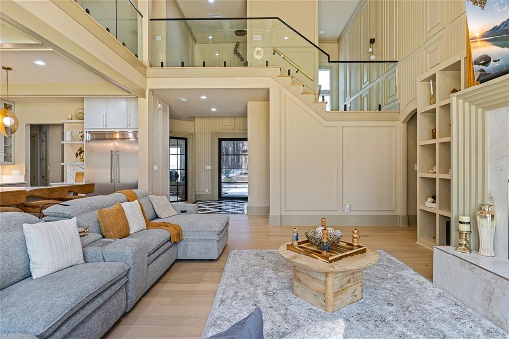 1315 Sandy Creek Road Fayetteville, GA 30214 - Photo 25 of 107 a living room with furniture and a chandelier