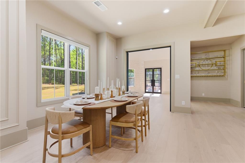 1315 Sandy Creek Road Fayetteville, GA 30214 - Photo 44 of 107 a dining room with furniture and window