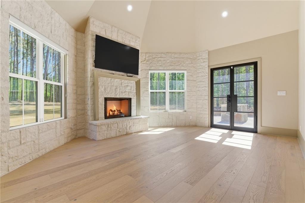 1315 Sandy Creek Road Fayetteville, GA 30214 - Photo 55 of 107 a view of an empty room with a fireplace and a window