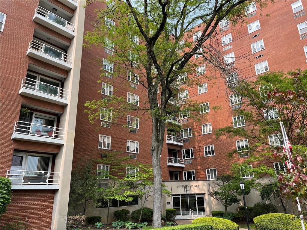 4601 Fifth Avenue, Unit 326 Pittsburgh, PA 15213 - Photo 1 of 20 a front view of a multi story building with a yard