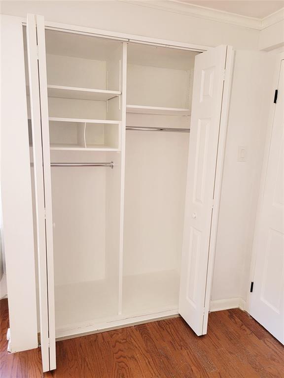 4601 Fifth Avenue, Unit 326 Pittsburgh, PA 15213 - Photo 15 of 20 a view of an empty room with wooden floor