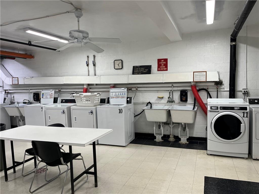 4601 Fifth Avenue, Unit 326 Pittsburgh, PA 15213 - Photo 19 of 20 a kitchen with a table and chairs in it