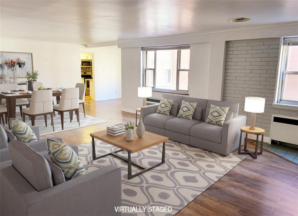 4601 Fifth Avenue, Unit 326 Pittsburgh, PA 15213 - Photo 2 of 20 a living room with furniture and wooden floor