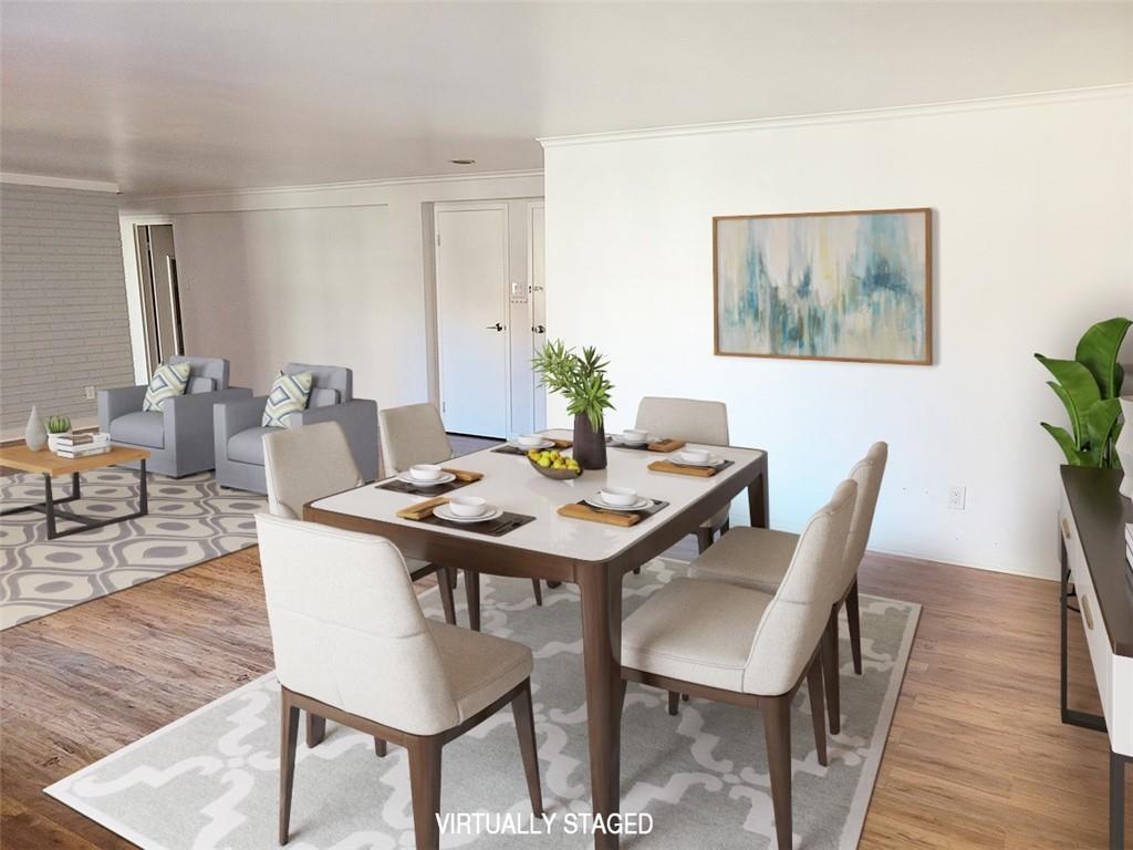 4601 Fifth Avenue, Unit 326 Pittsburgh, PA 15213 - Photo 4 of 20 a view of a dining room with furniture and wooden floor