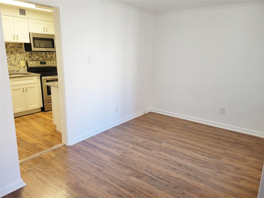 4601 Fifth Avenue, Unit 326 Pittsburgh, PA 15213 - Photo 7 of 20 a view of a kitchen from the hallway