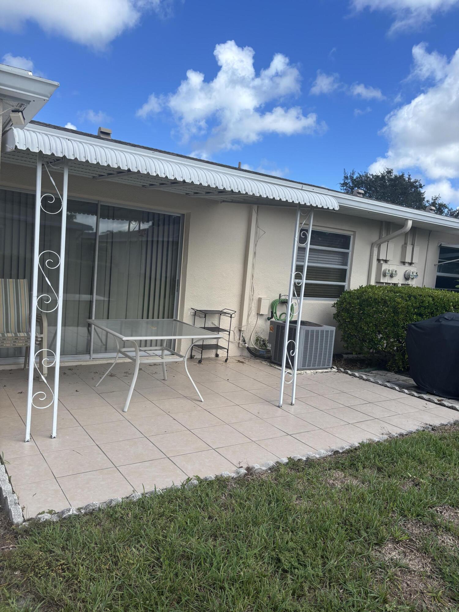 8608 Bella Vista Drive Boca Raton, FL 33433 - Photo 11 of 11 a house with outdoor space