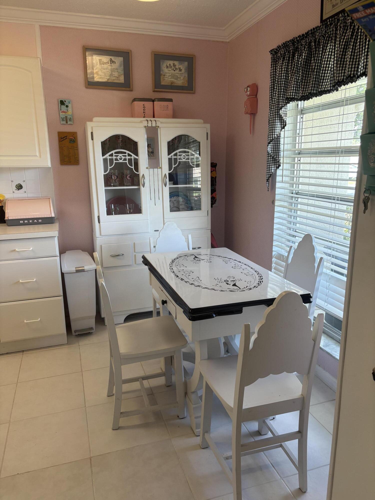 8608 Bella Vista Drive Boca Raton, FL 33433 - Photo 2 of 11 a view of a dining room with furniture