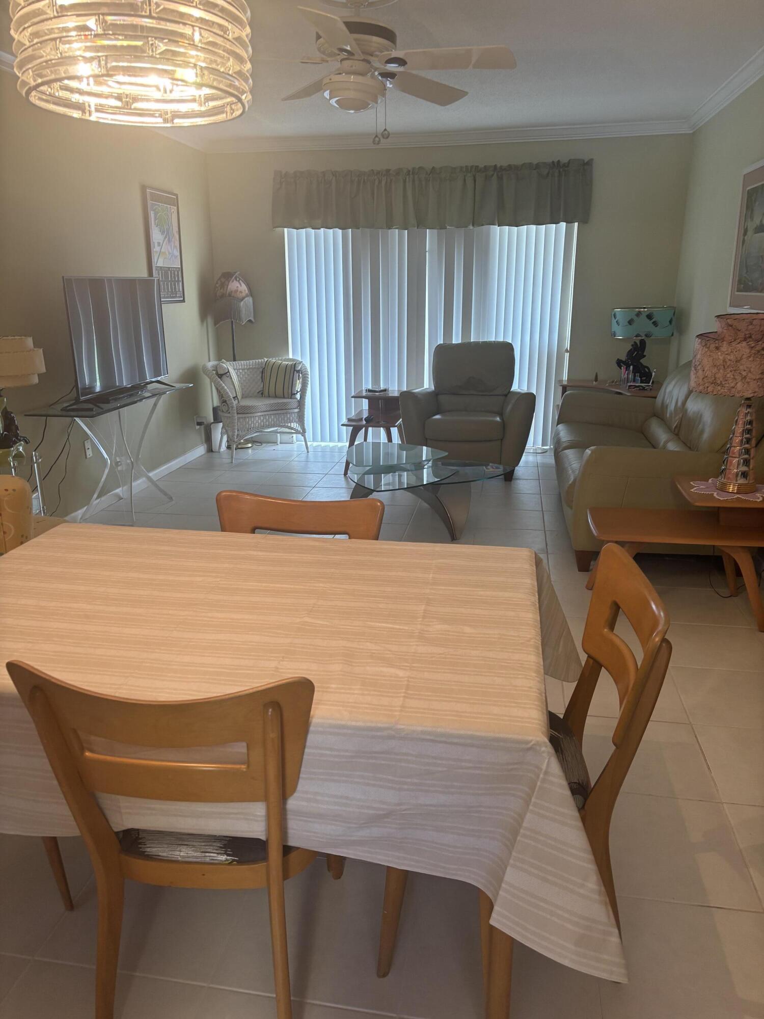 8608 Bella Vista Drive Boca Raton, FL 33433 - Photo 5 of 11 a view of kitchen with dining area