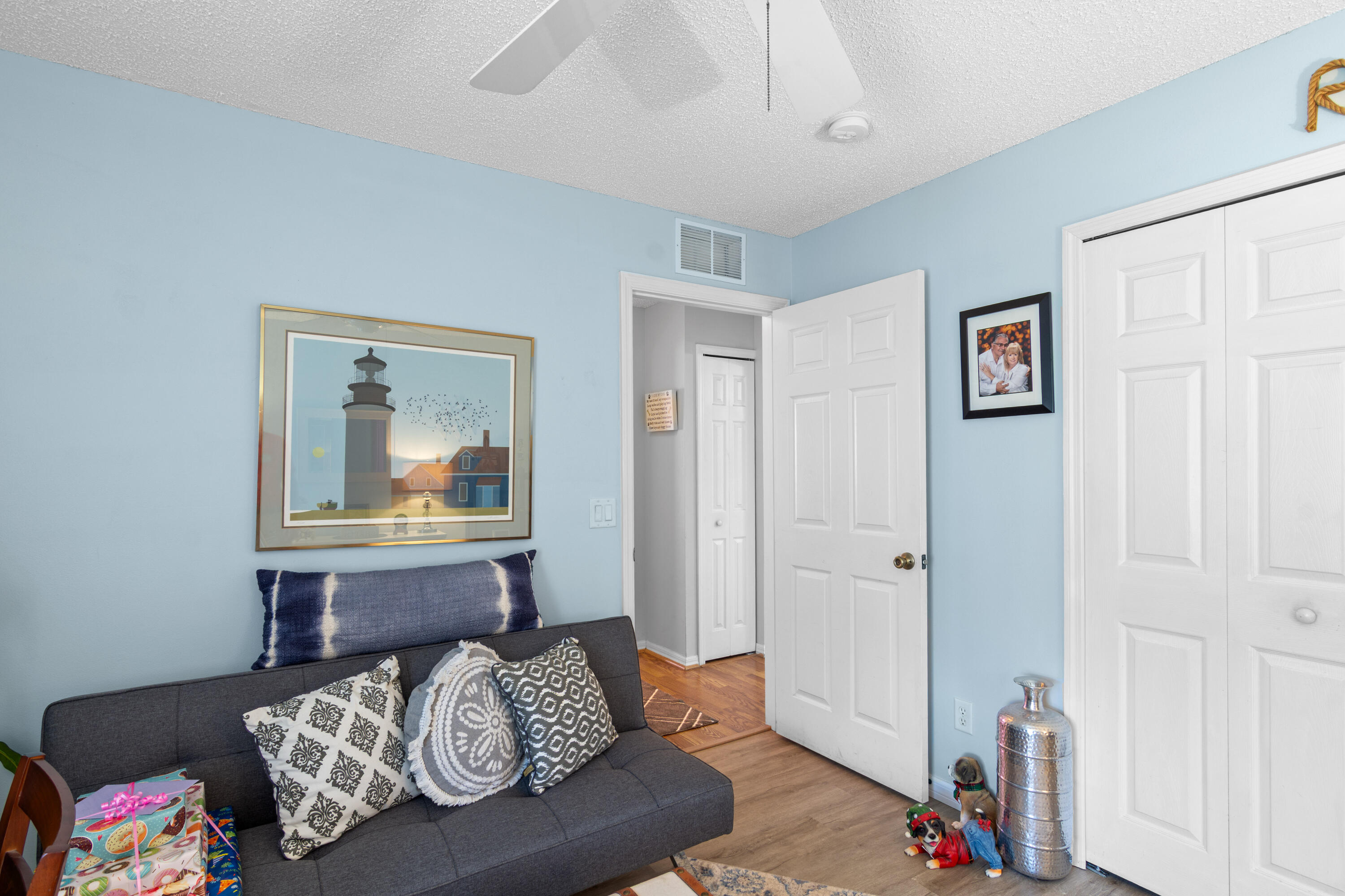 1817 Southwest Davis Street Port St. Lucie, FL 34953 - Photo 20 of 52 a bedroom with furniture and a window