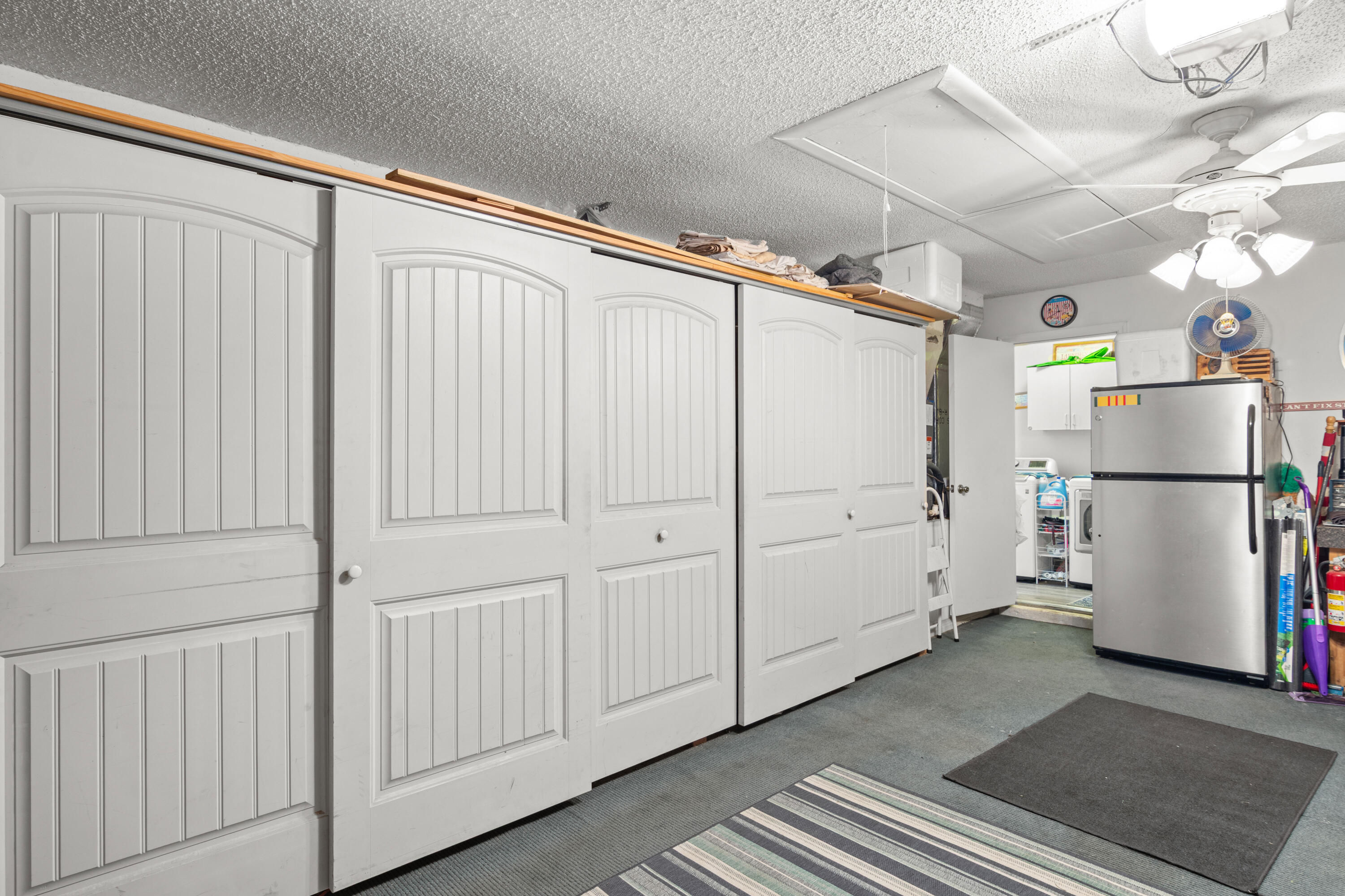 1817 Southwest Davis Street Port St. Lucie, FL 34953 - Photo 31 of 52 a white refrigerator freezer and a dishwasher sitting in a kitchen