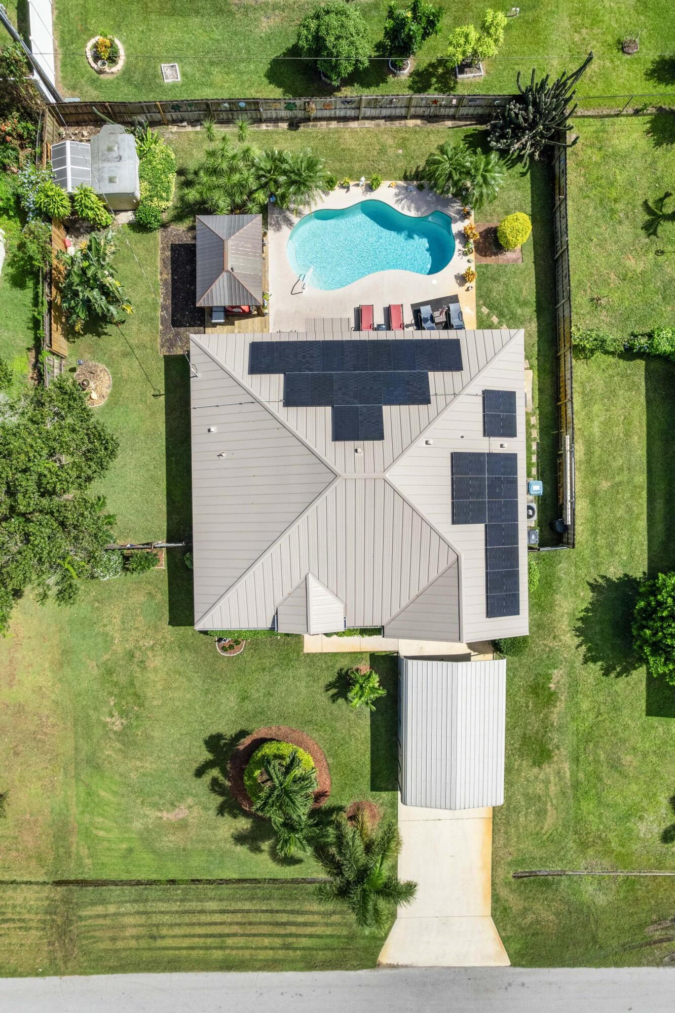 1817 Southwest Davis Street Port St. Lucie, FL 34953 - Photo 42 of 52 a view of a balcony with floor to ceiling windows and yard